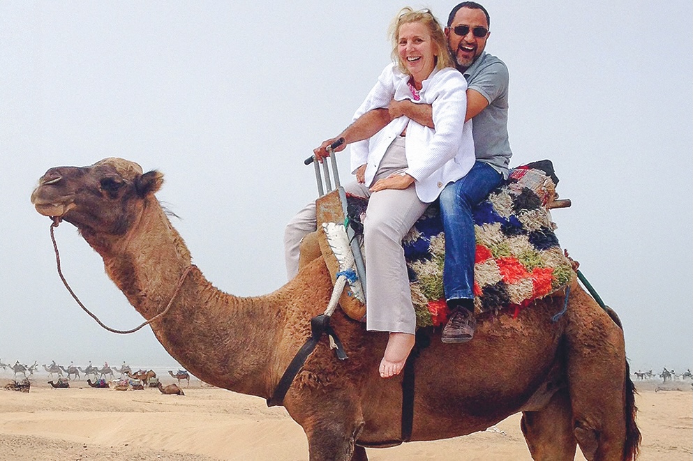 Nancy Lieberman riding a camel in Morocco, in October 2014