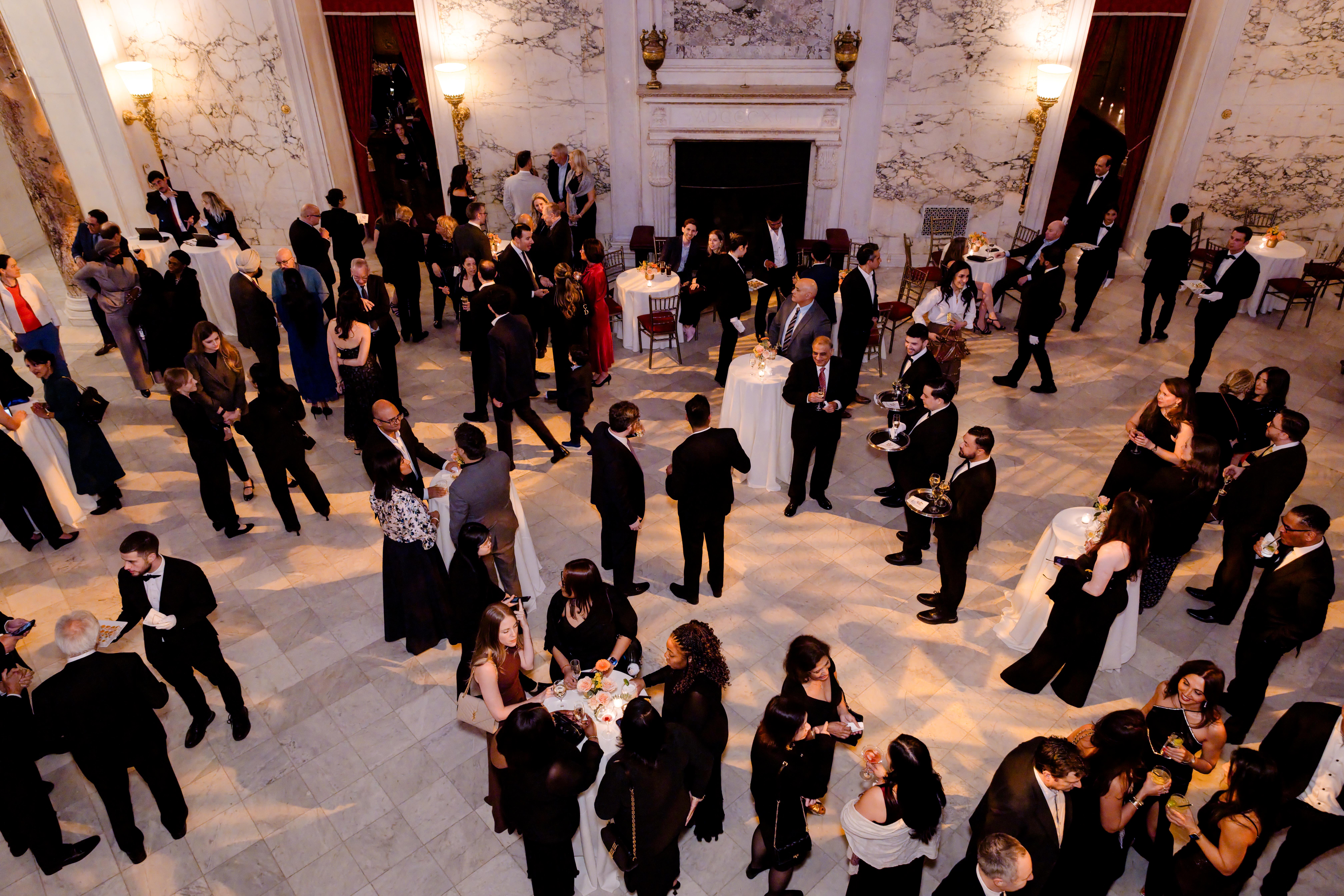 An overhead view of large reception area during MS Gala cocktail hour