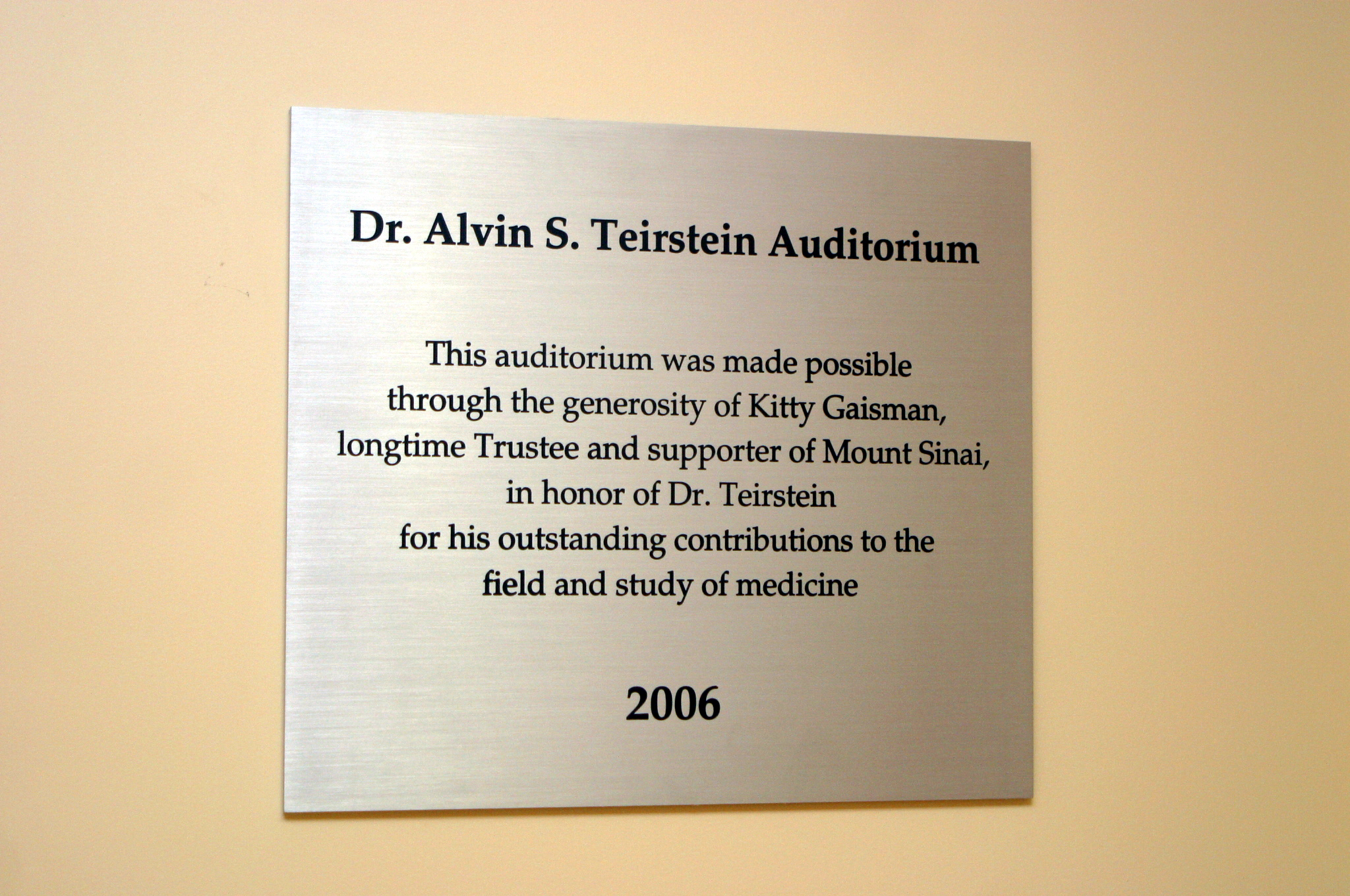 Plaque reading Dr. Alvin S. Teirstein Auditorium - This auditorium was made possible through the generosity of Kitty Gaisman, longtime Trustee and support of Mount Sinai, in honor of Dr. Teirstein for his outstanding contributions to the field and study of medicine -- 2006