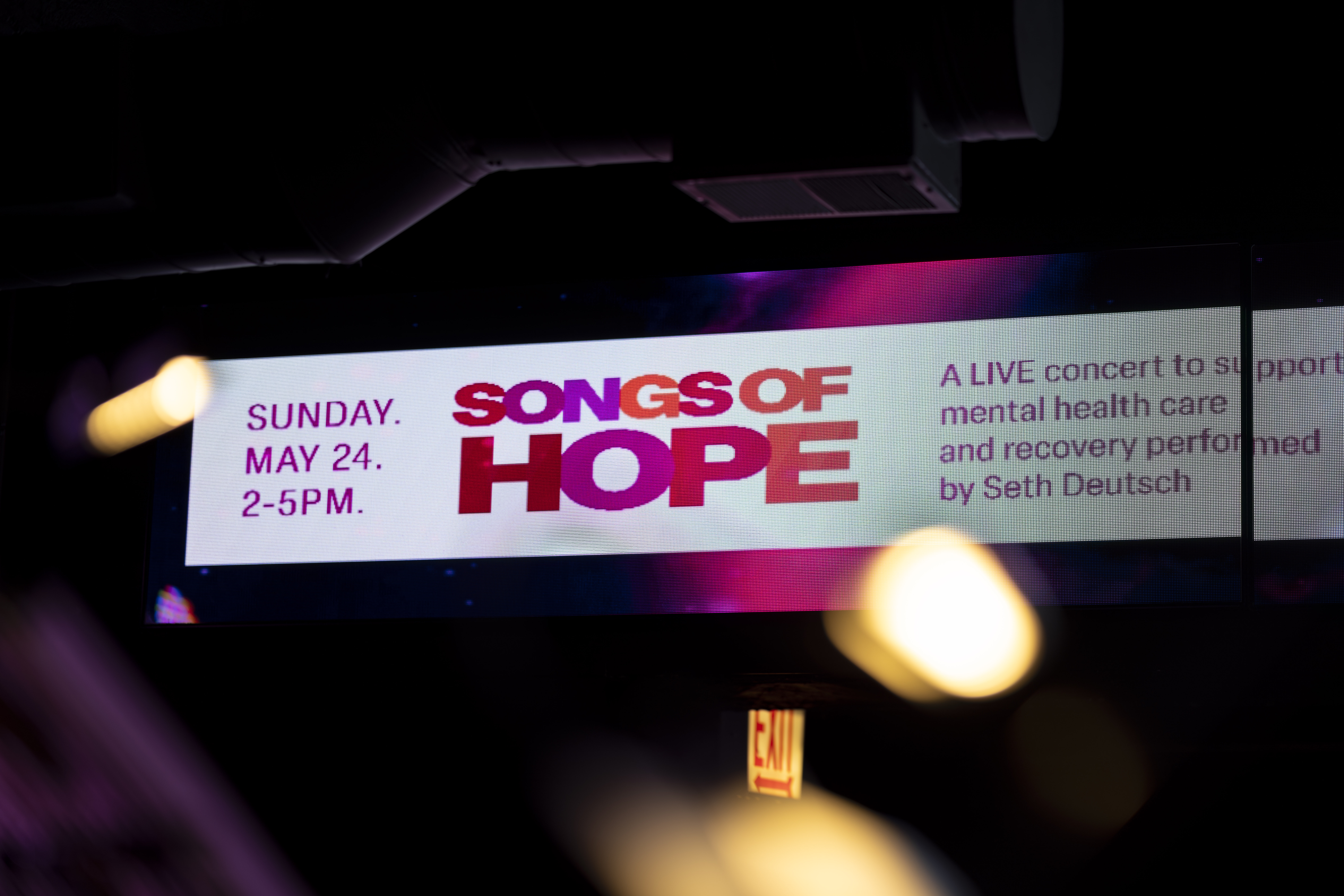 A digital banner that says Songs of Hope