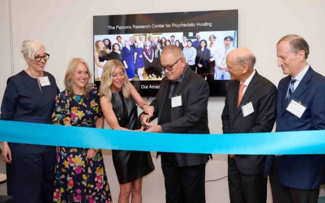 Bob Parsons cutting the ribbon of the new center in his name
