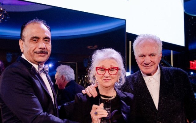 Dr. Tewari and the events honorees pose at the gala