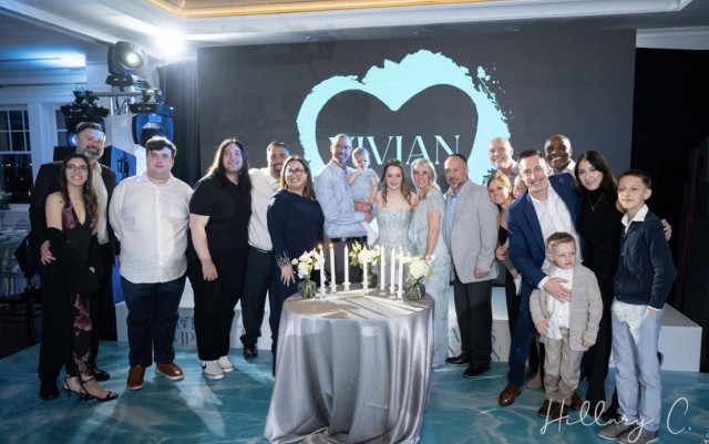 Bat Mitzvah Vivian surrounded by family