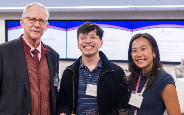 Dr. Evan Flatow with scholarship students Mr. Ortega Rios and Ms. Park