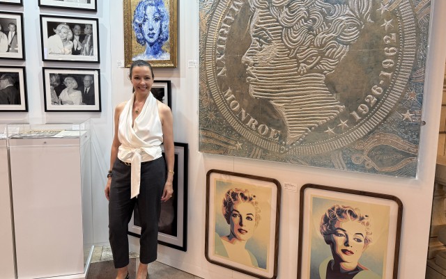 Donor Lori Hall stands within the Marilyn Monroe exhibit at Grand Central Terminal