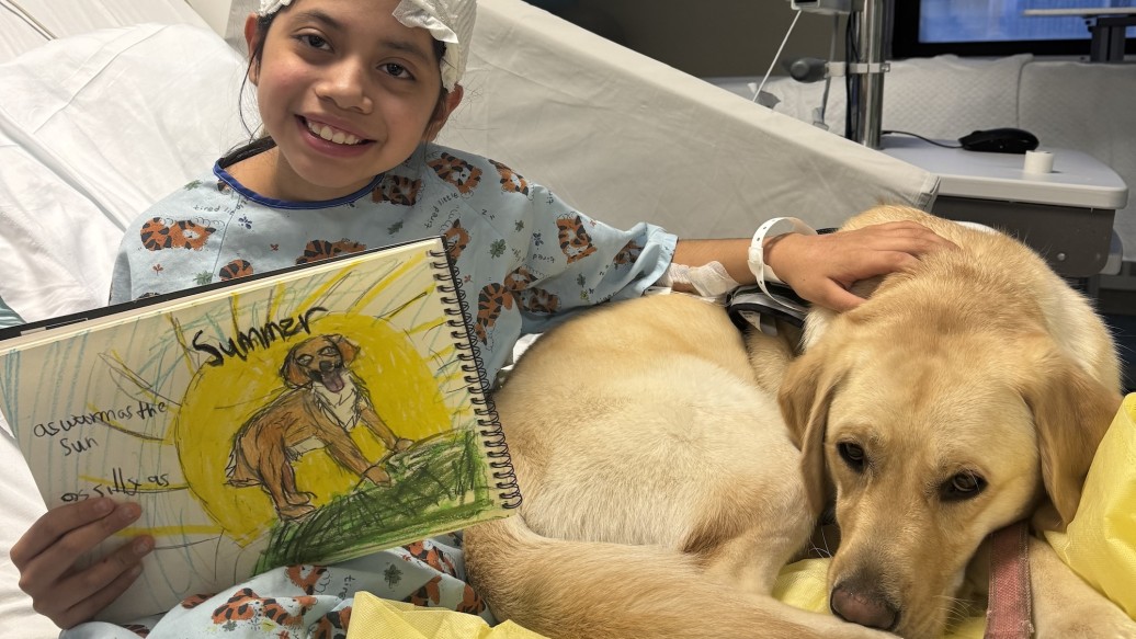 Vero with therapy dog, Summer