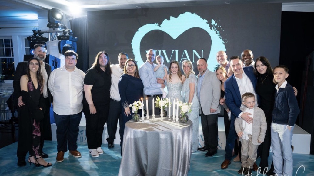 Bat Mitzvah Vivian surrounded by family