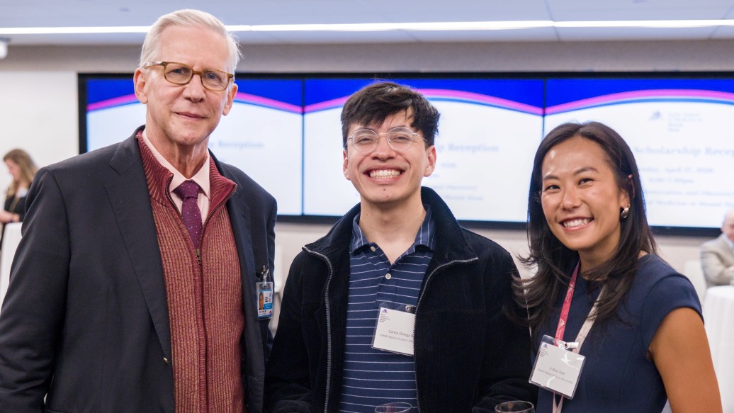 Dr. Evan Flatow with scholarship students Mr. Ortega Rios and Ms. Park