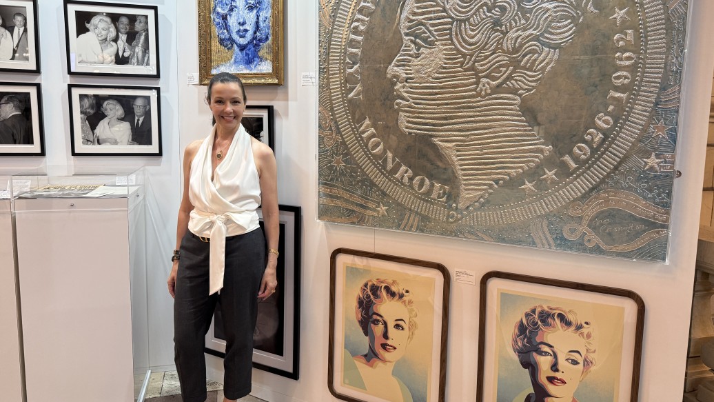 Donor Lori Hall stands within the Marilyn Monroe exhibit at Grand Central Terminal
