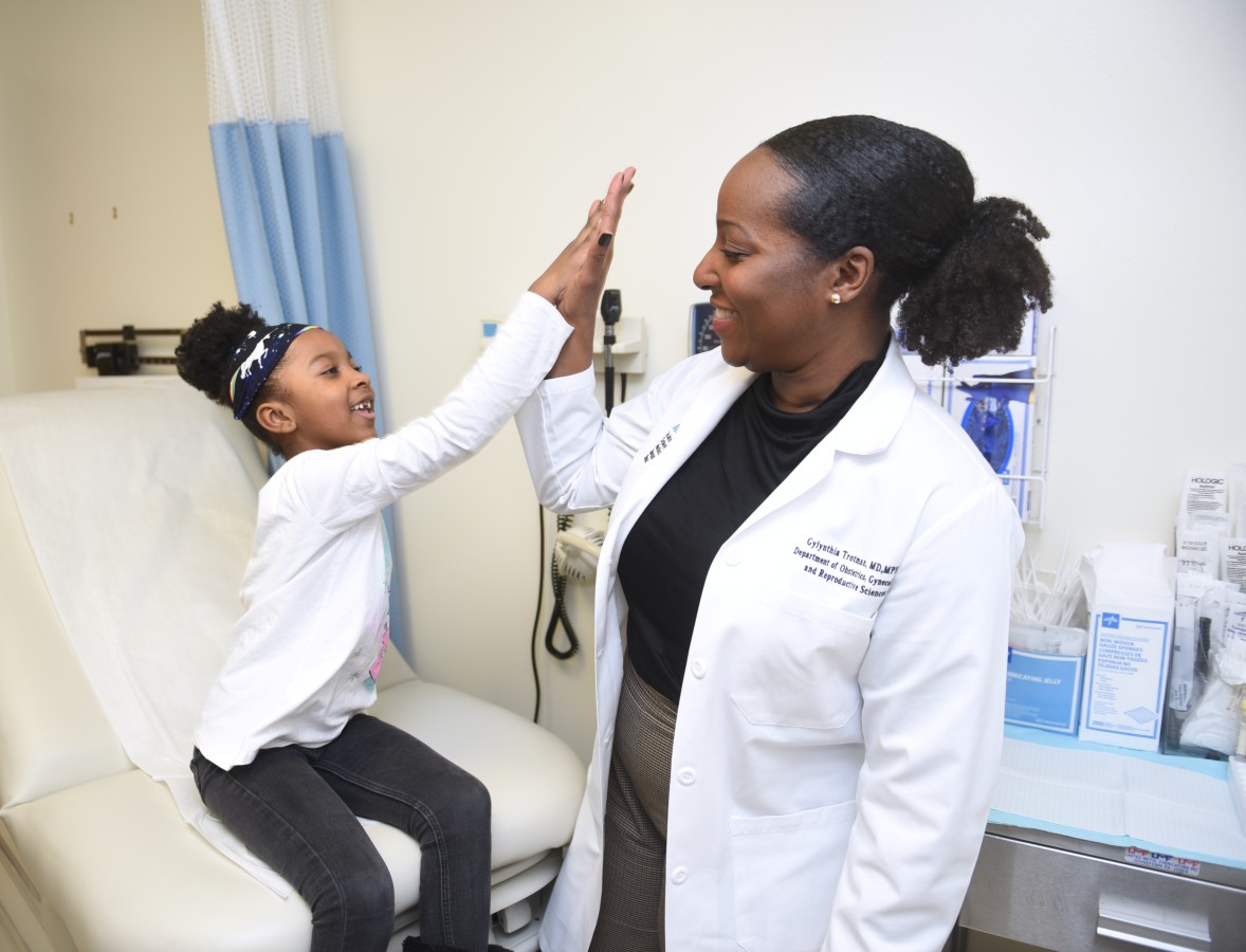 Doctor and Pediatric Patient High-Five