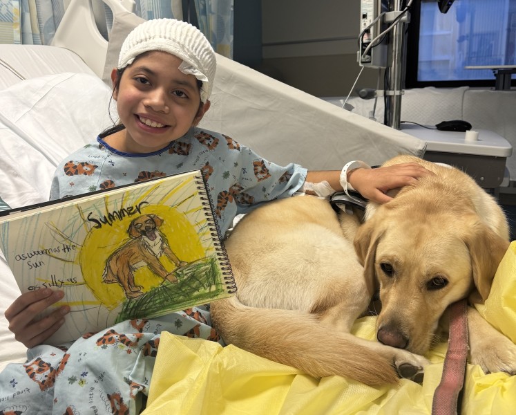 Vero with therapy dog, Summer